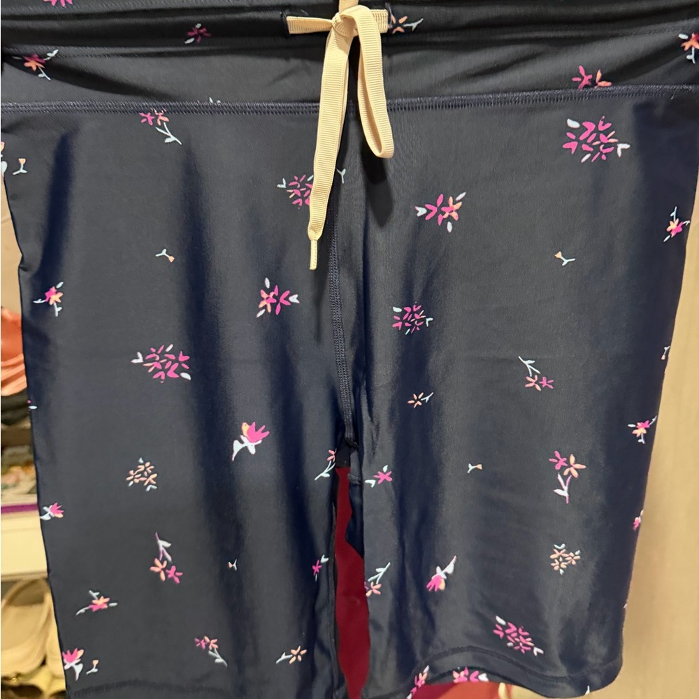 The Upside Navy Floral Swim Shorts